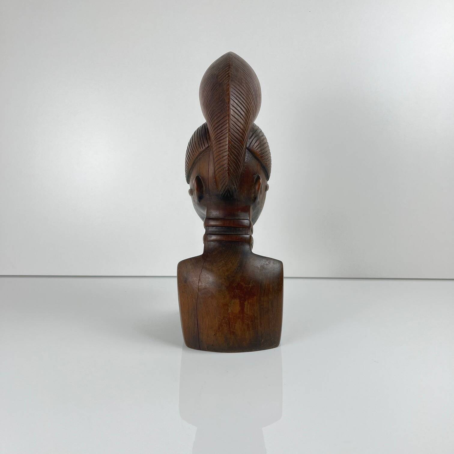 Hand-carved female bust in black wood, Baoulé style, 1960/90