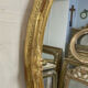 Miroir oval en bois doré 70x49cm