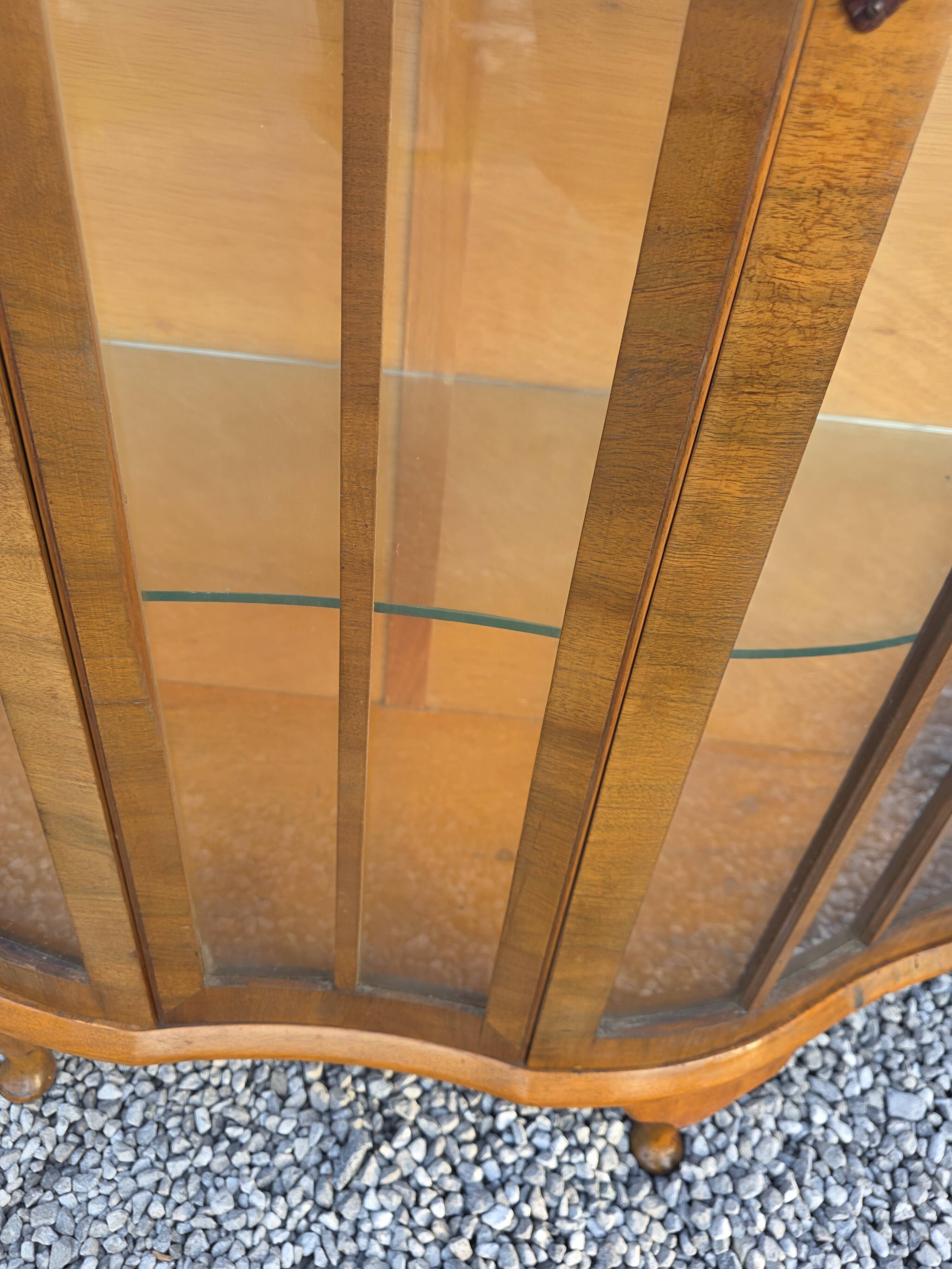 Art Deco display cabinet in walnut from the 1930s.