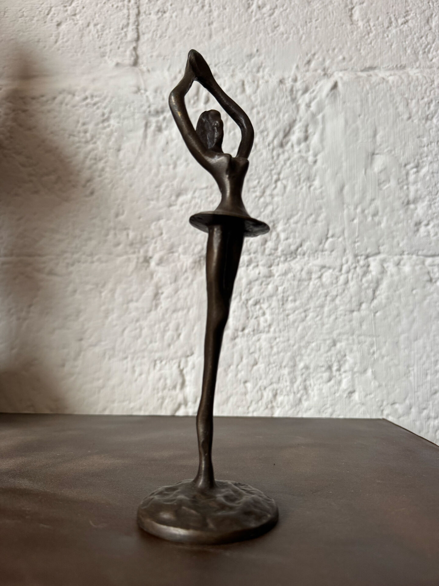 Small bronze dancer in 1980s modernist style.