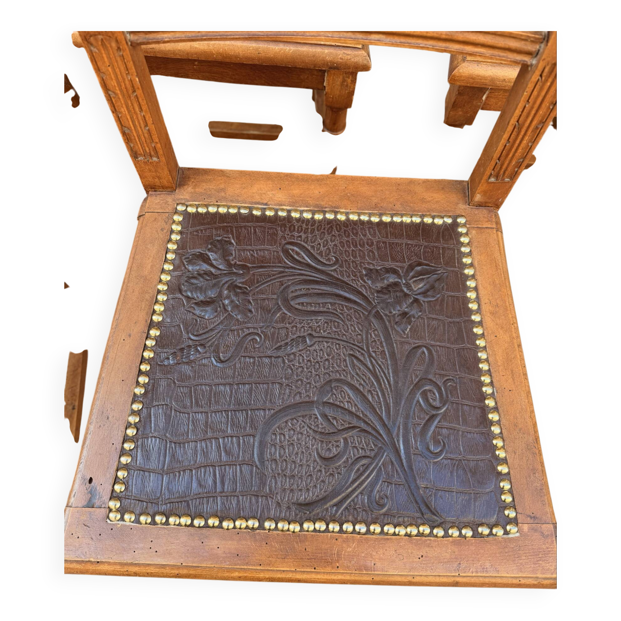 Set of 6 antique turned wooden chairs with embossed leather seats.