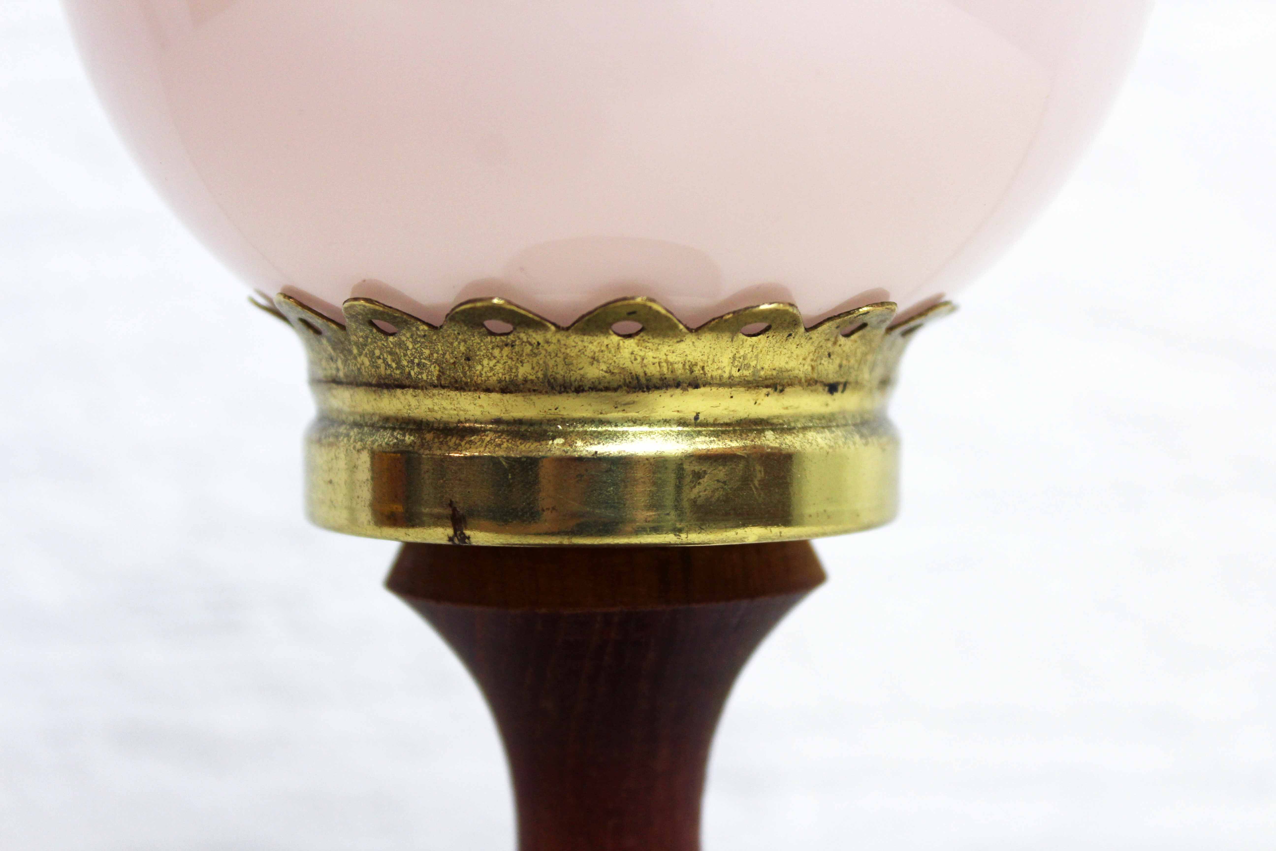 Teak table lamp and pink glass