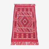 Red hand-woven carpet in pure wool