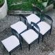 5 vintage chairs in dark wood and bouclé wool