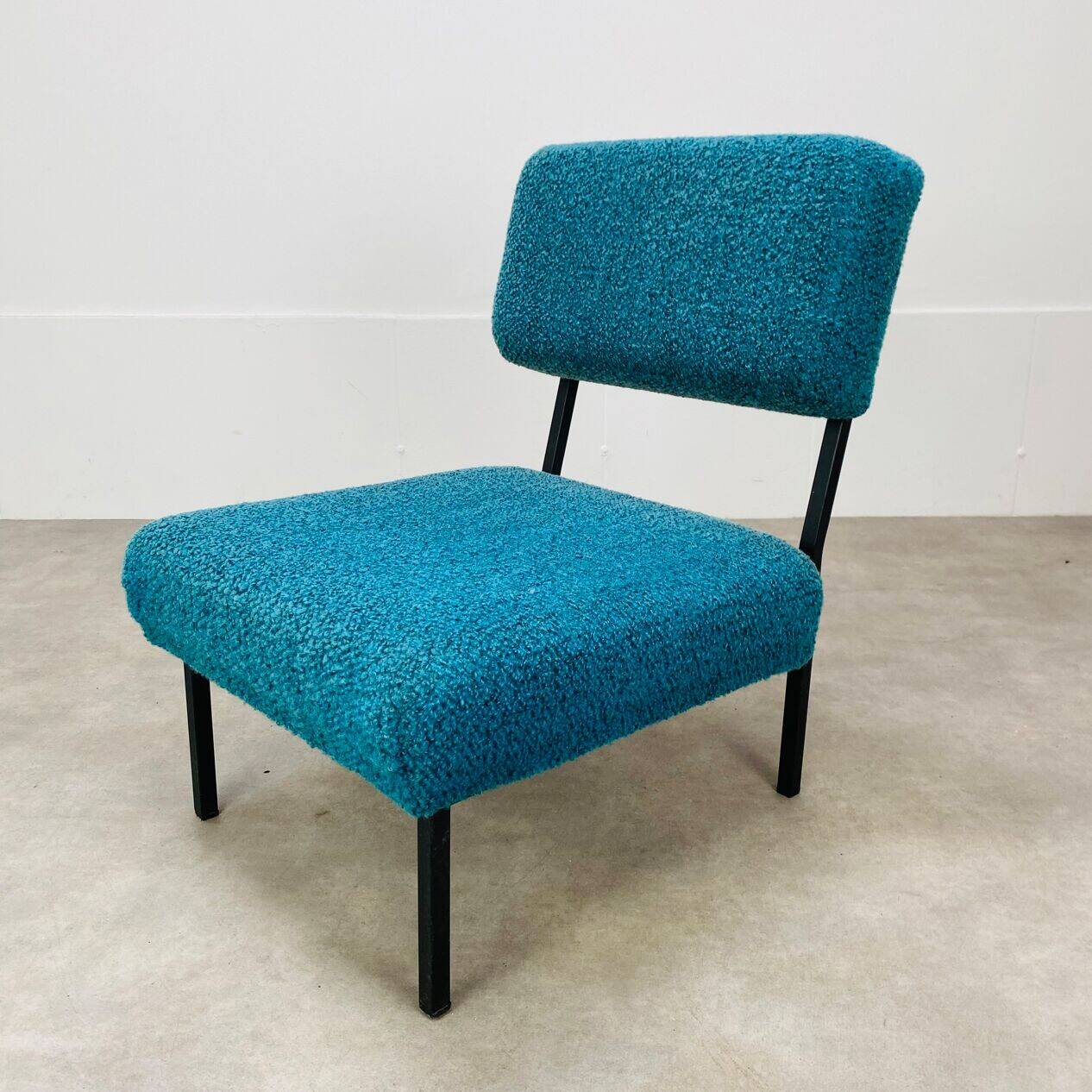 Modernist armchair from the 1950s in vintage blue boucle fabric.