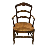 Provencal style straw armchair sometimes called marsh armchair
