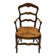 Provencal style straw armchair sometimes called marsh armchair