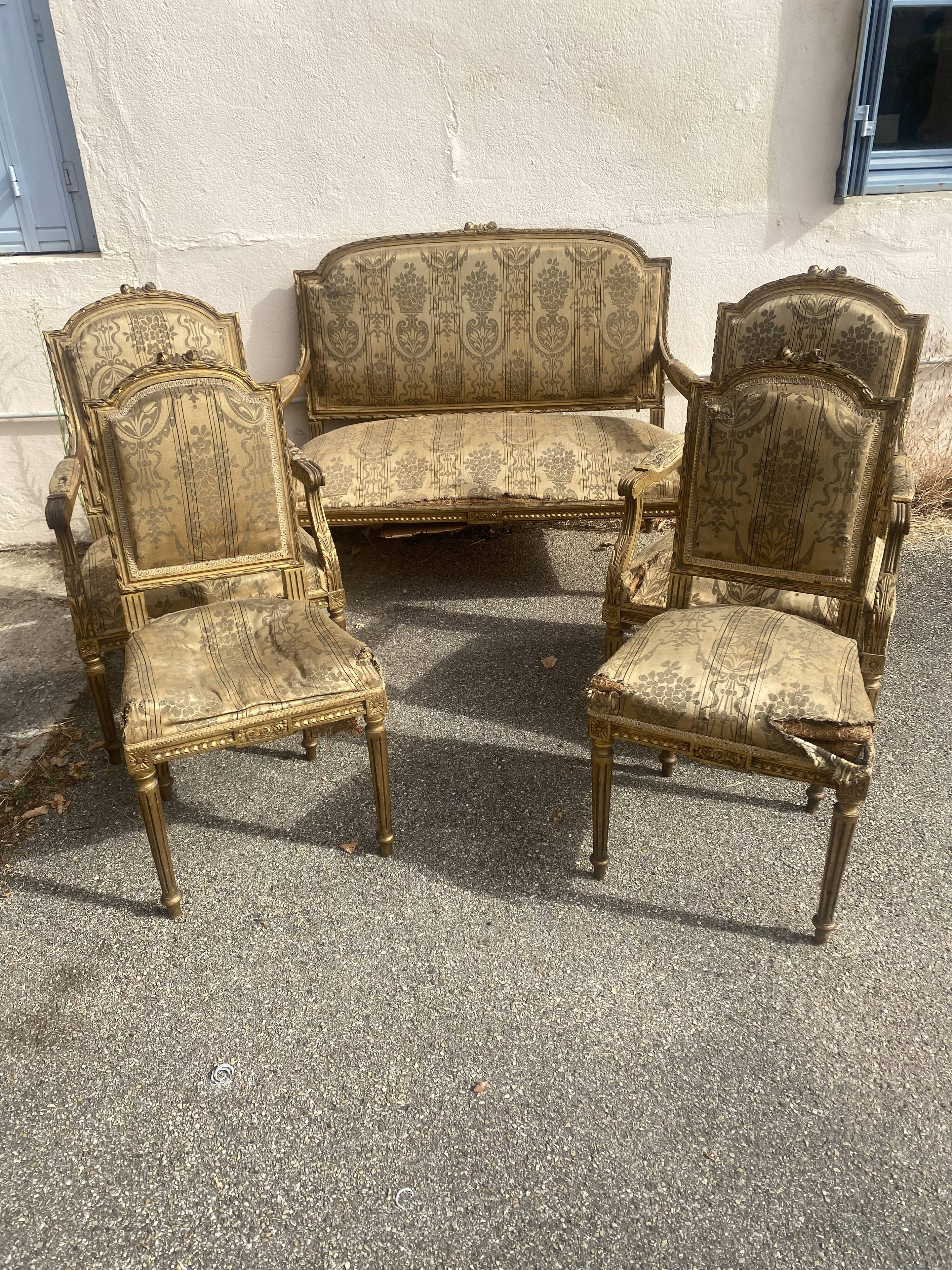Louis XVI style living room in gilded wood. Napoleon III period