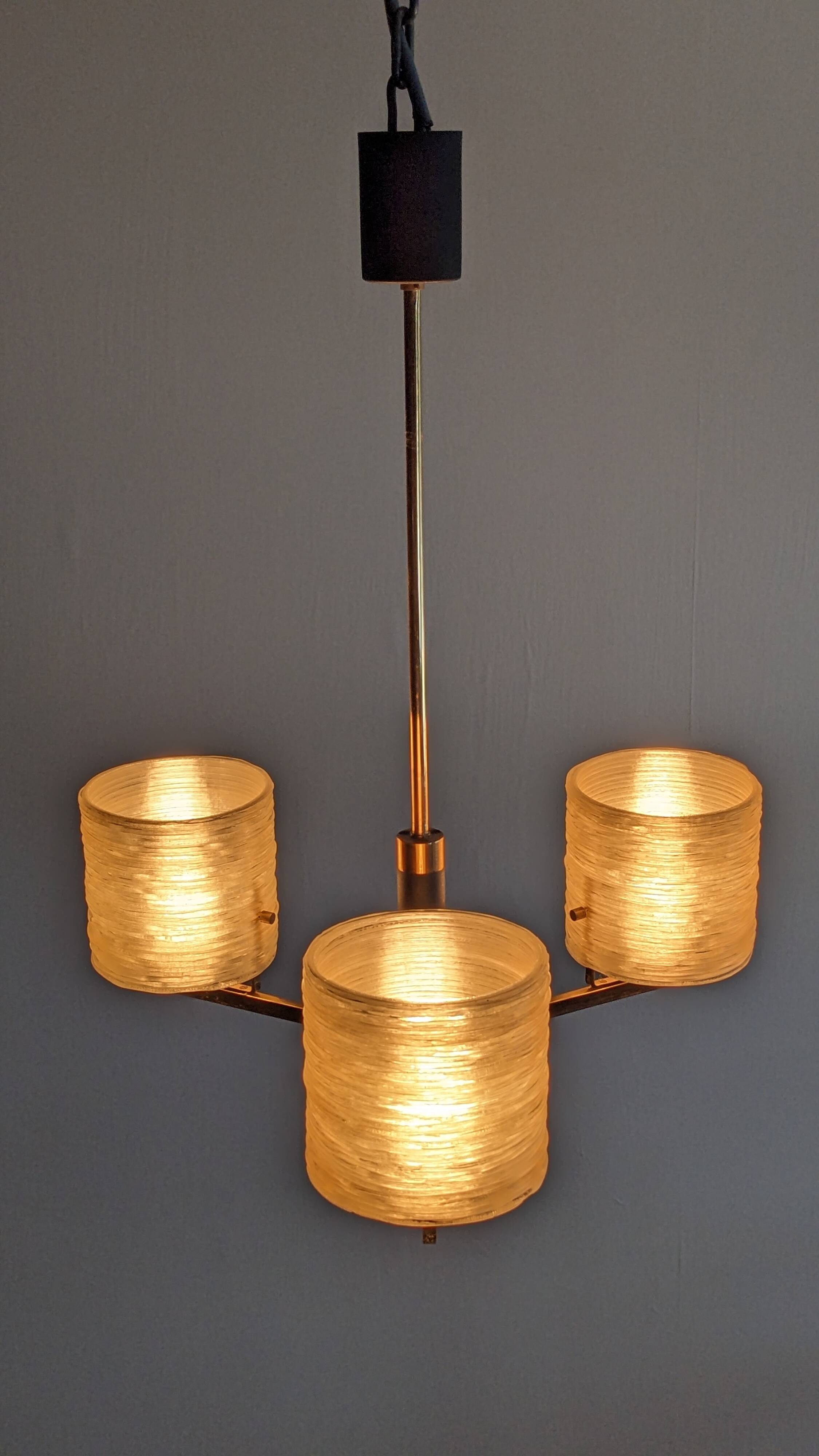 Three-light chandelier in mother-of-pearl and brass, Maison Arlus, France, circa 1950.