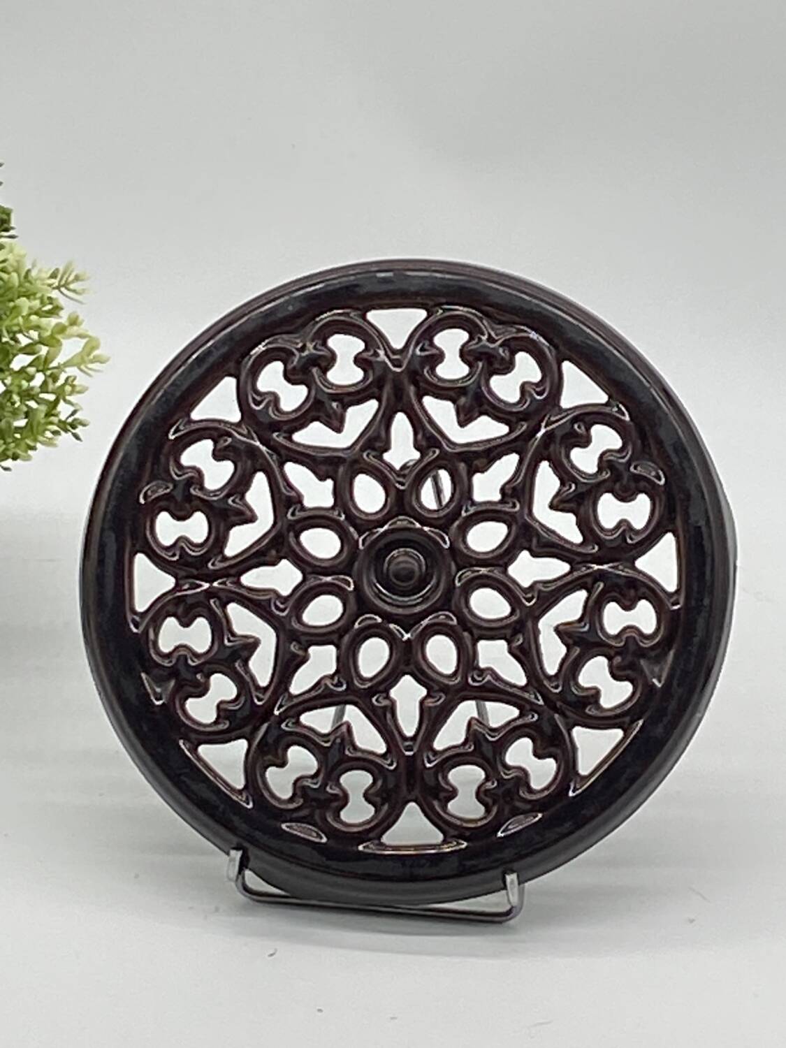 Brown enameled cast iron trivet vintage, old
