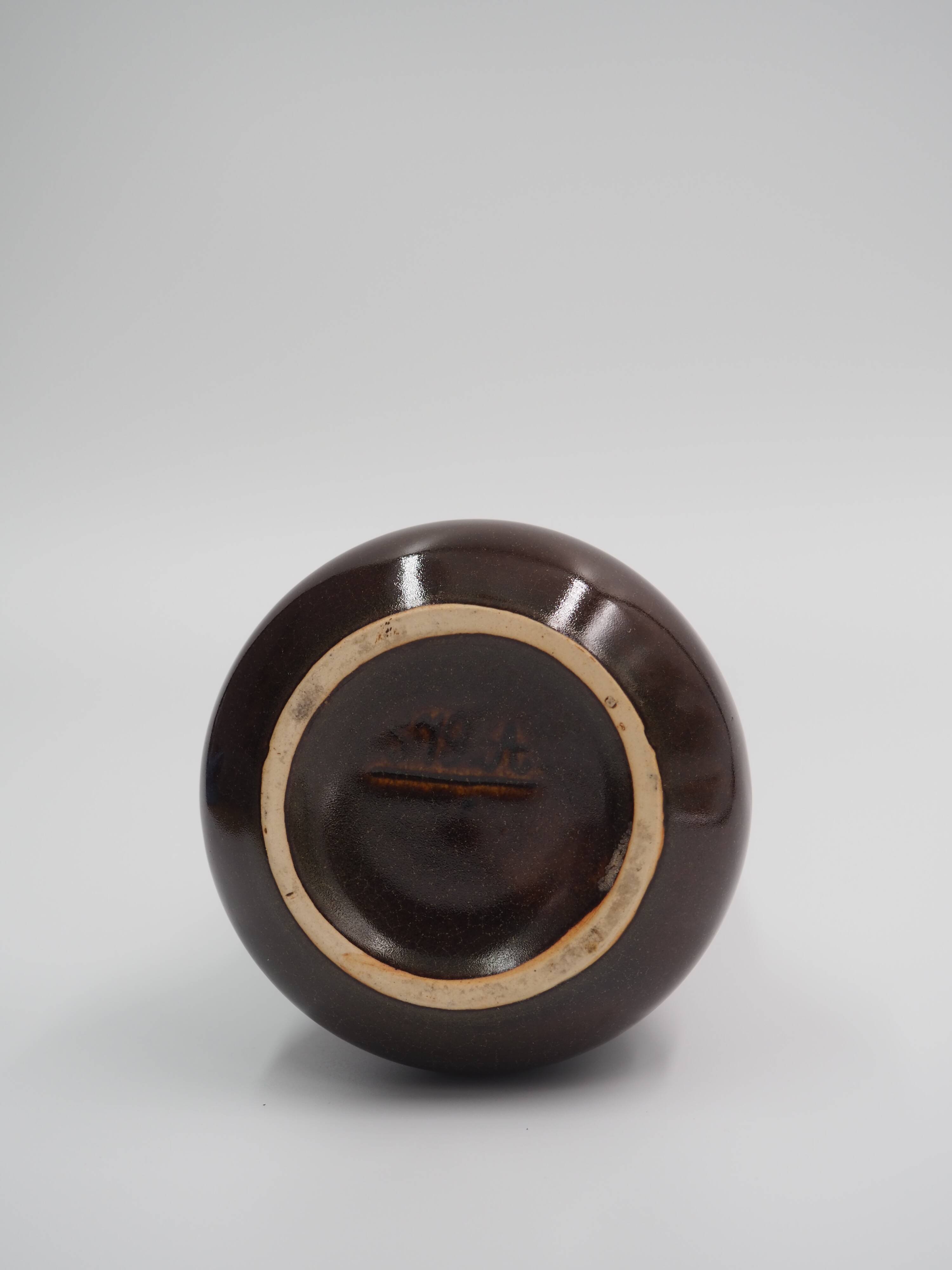 Small brown ceramic vase