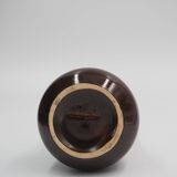 Small brown ceramic vase