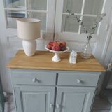 Compact buffet re-enchanted in grey-green, wooden top.