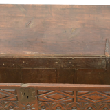 Antique chest in carved wood