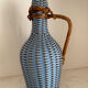 Rattan and scoubidou bottle
