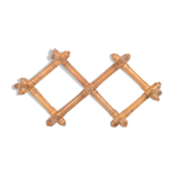 Wall accordion coat holder