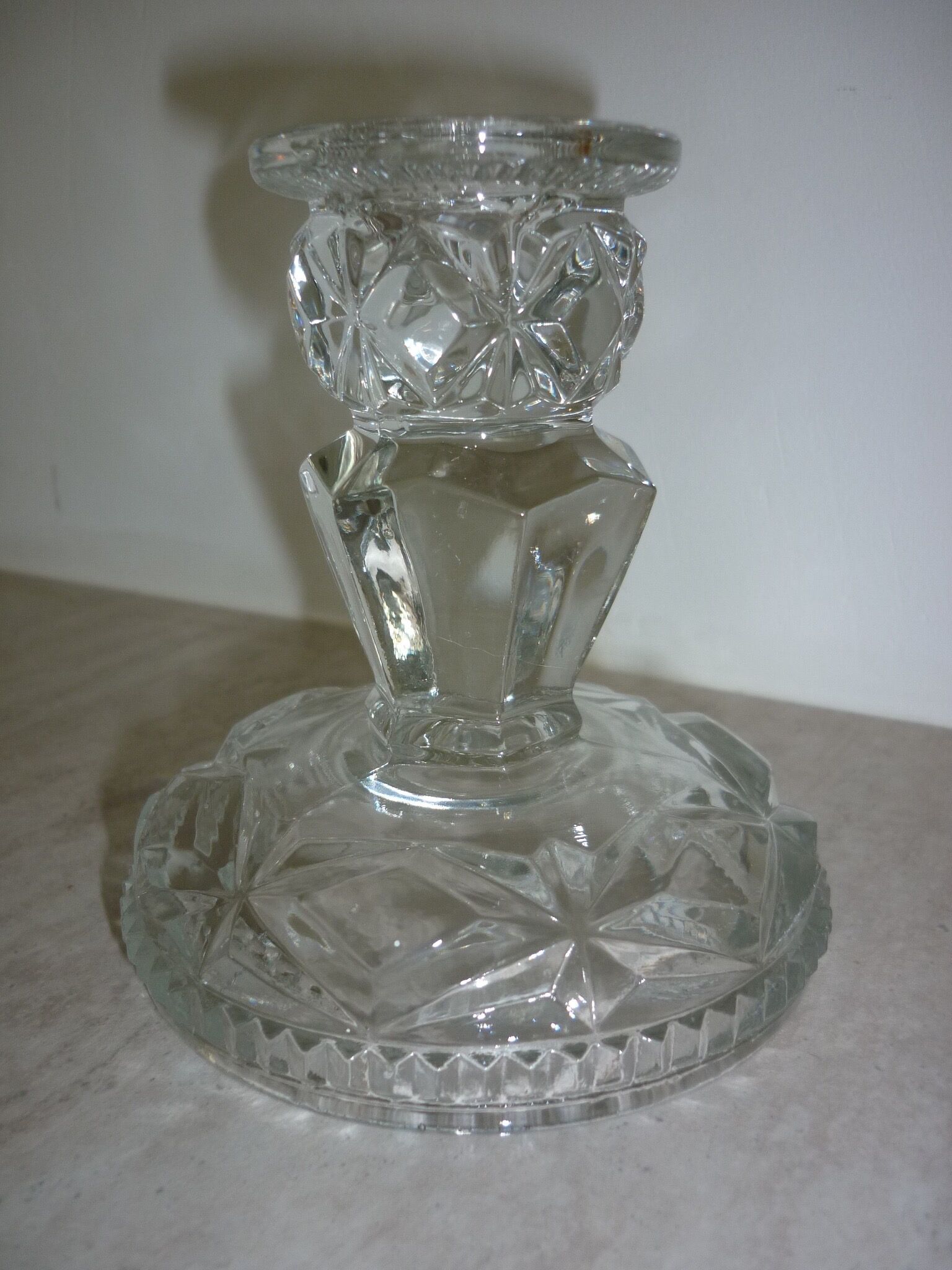 Chiseled pressed glass candle holder