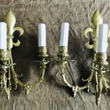 Paire d’appliques fleurs de lys bronze 3 lumières