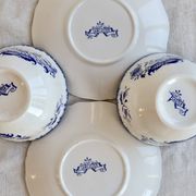 Old Lancaster cups and saucers in white earthenware with blue decoration.