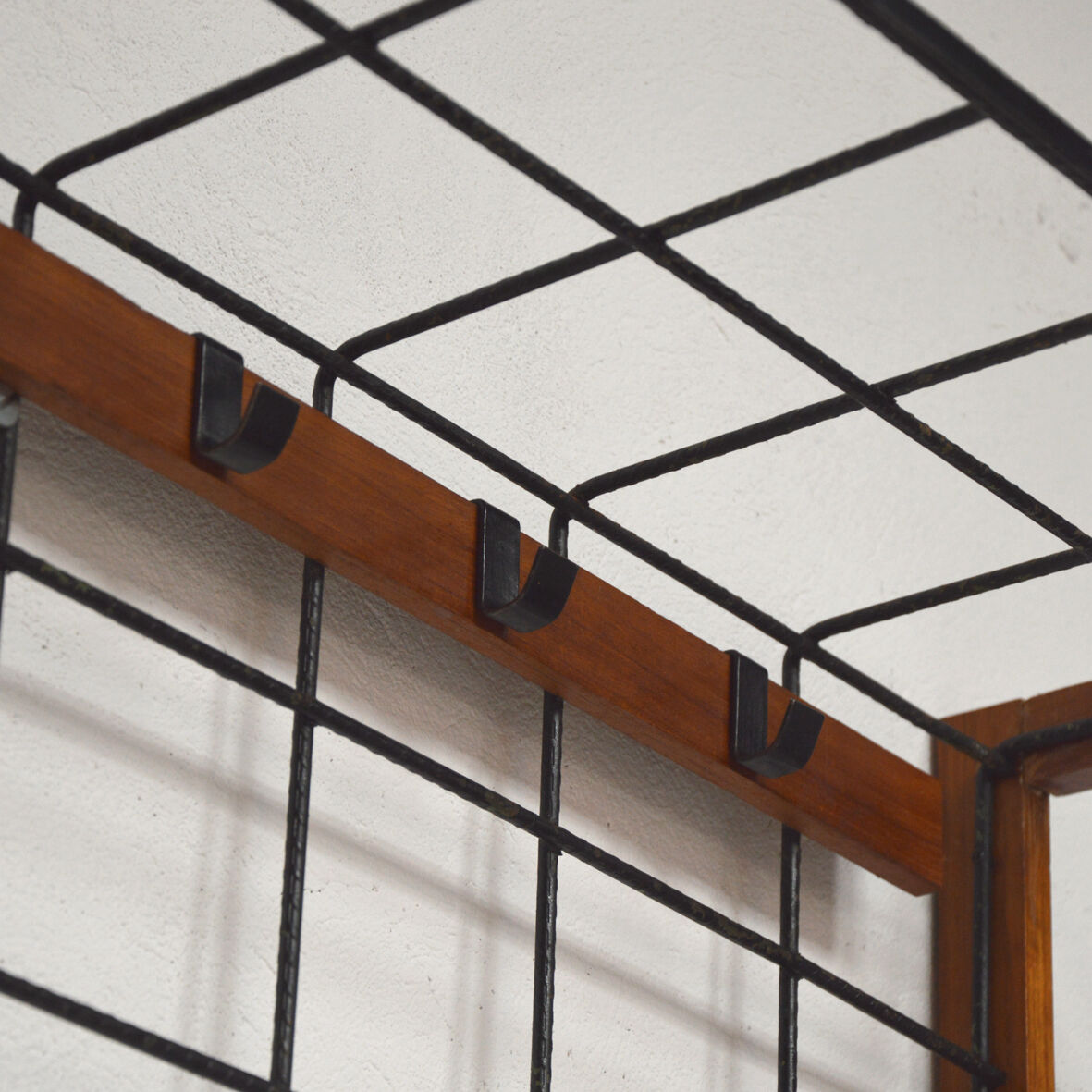 Iron and wood wall coat holders, 1960