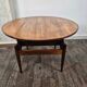 Round rosewood coffee table with adjustable height, Denmark, 1960.
