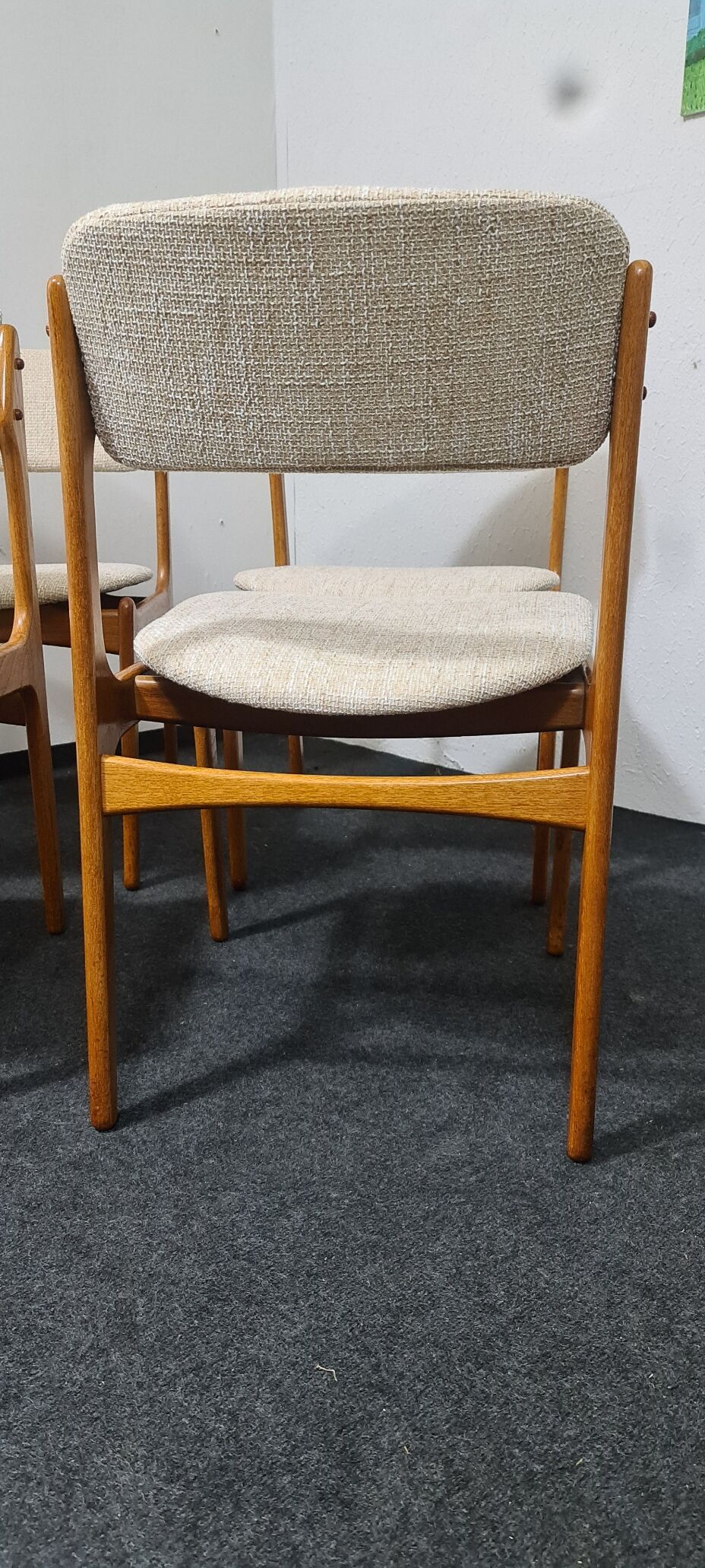 A set of four vintage teak dining chairs