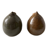 Pair of vintage round stoneware salt and pepper shakers