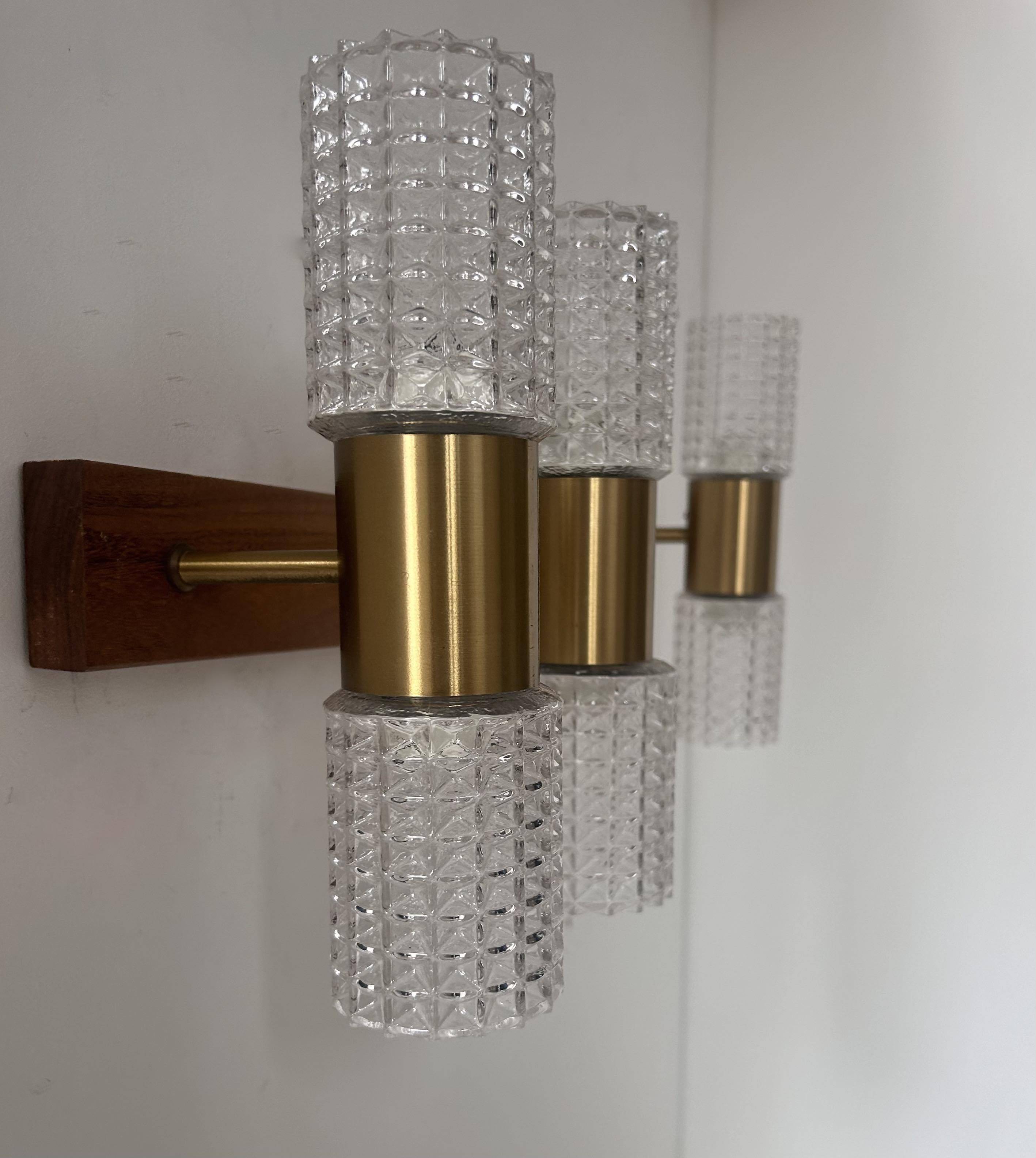 Pair of vintage wall lights, brass and molded glass, Sweden 1960s