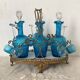 Antique Legras liquor cabinet, decanters and glasses, lion's paw stand