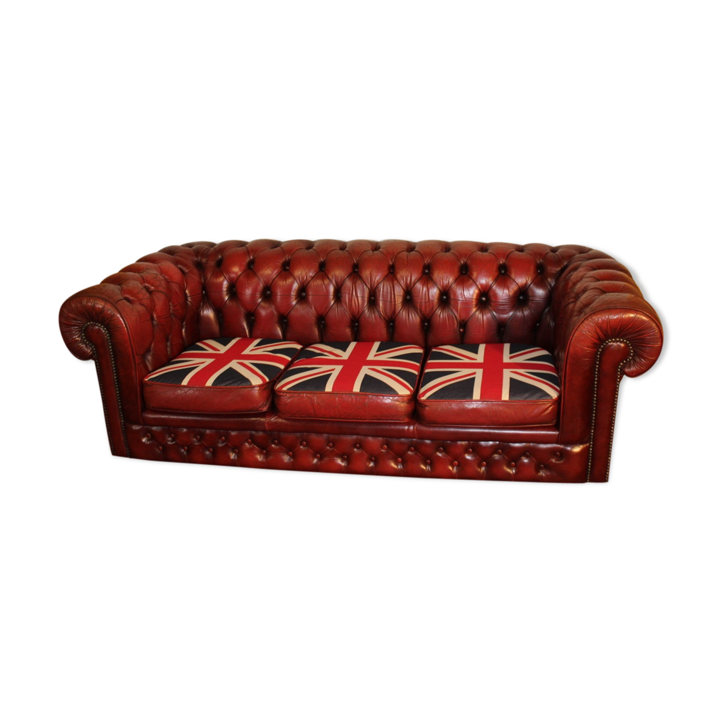 Red 3 x seater chesterfiel with Union Jack cushions