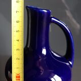 Old ceramic decanter Dolfi vase