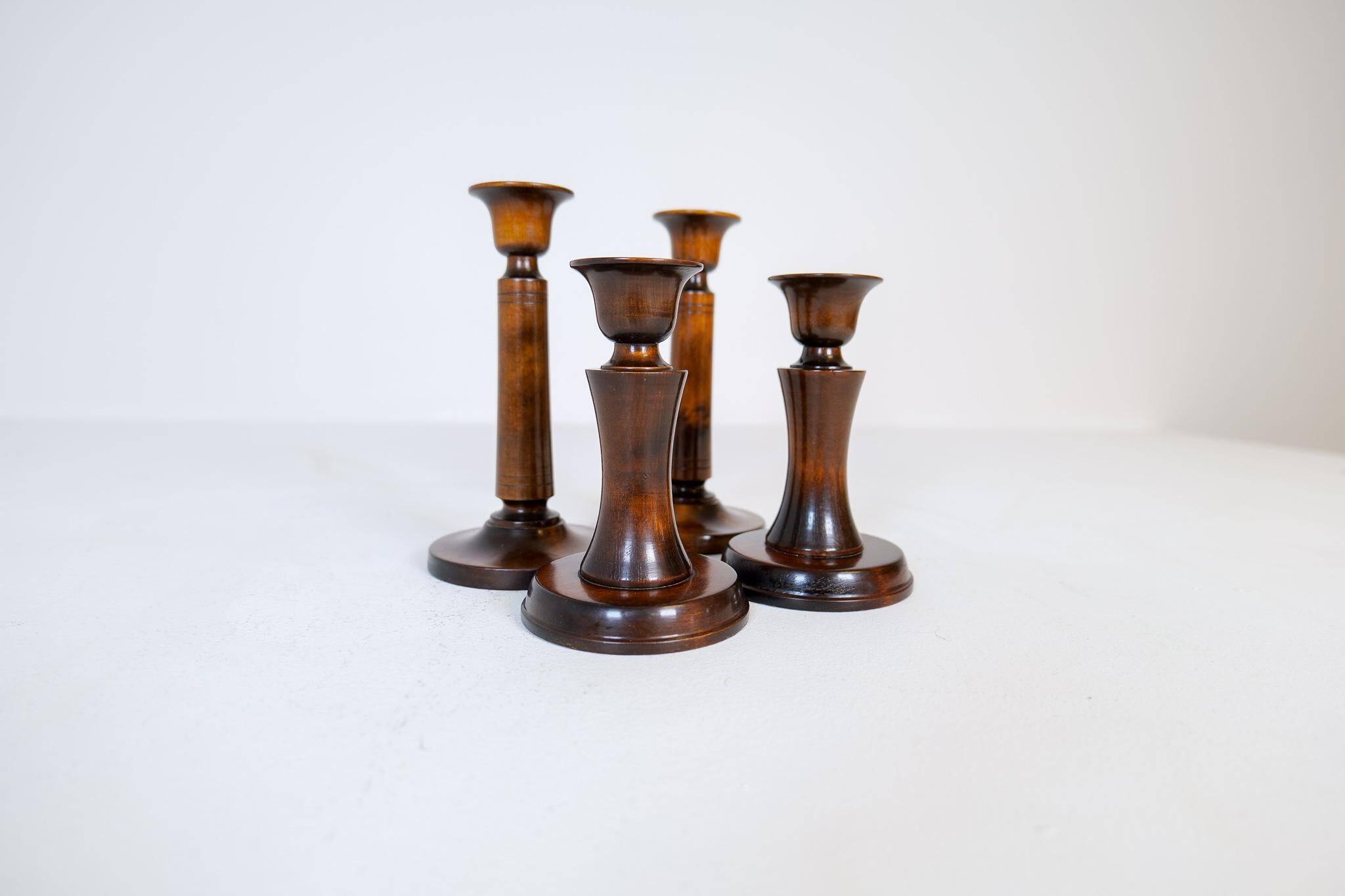 Mid-century set of 4 birch candlesticks by Carl Malmsten, Sweden, 1960s.