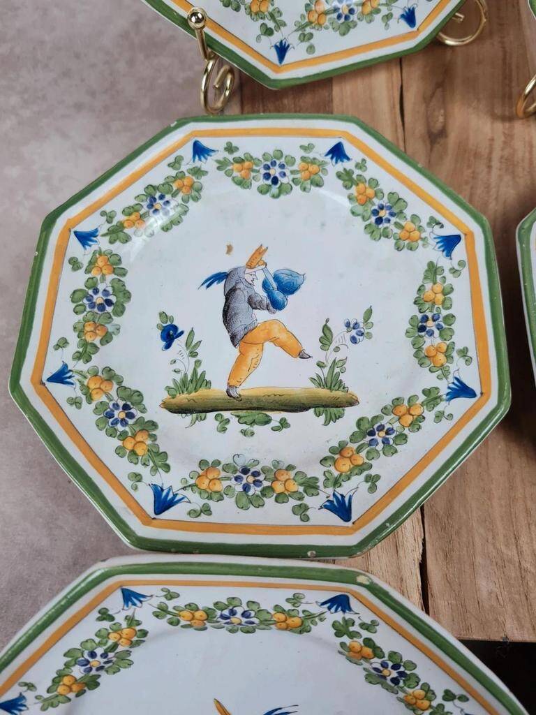 Set of 12 small antique plates by Alfred Renoleau, different designs.