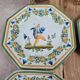 Set of 12 small antique plates by Alfred Renoleau, different designs.