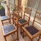 Set of 6 antique turned wooden chairs with embossed leather seats.
