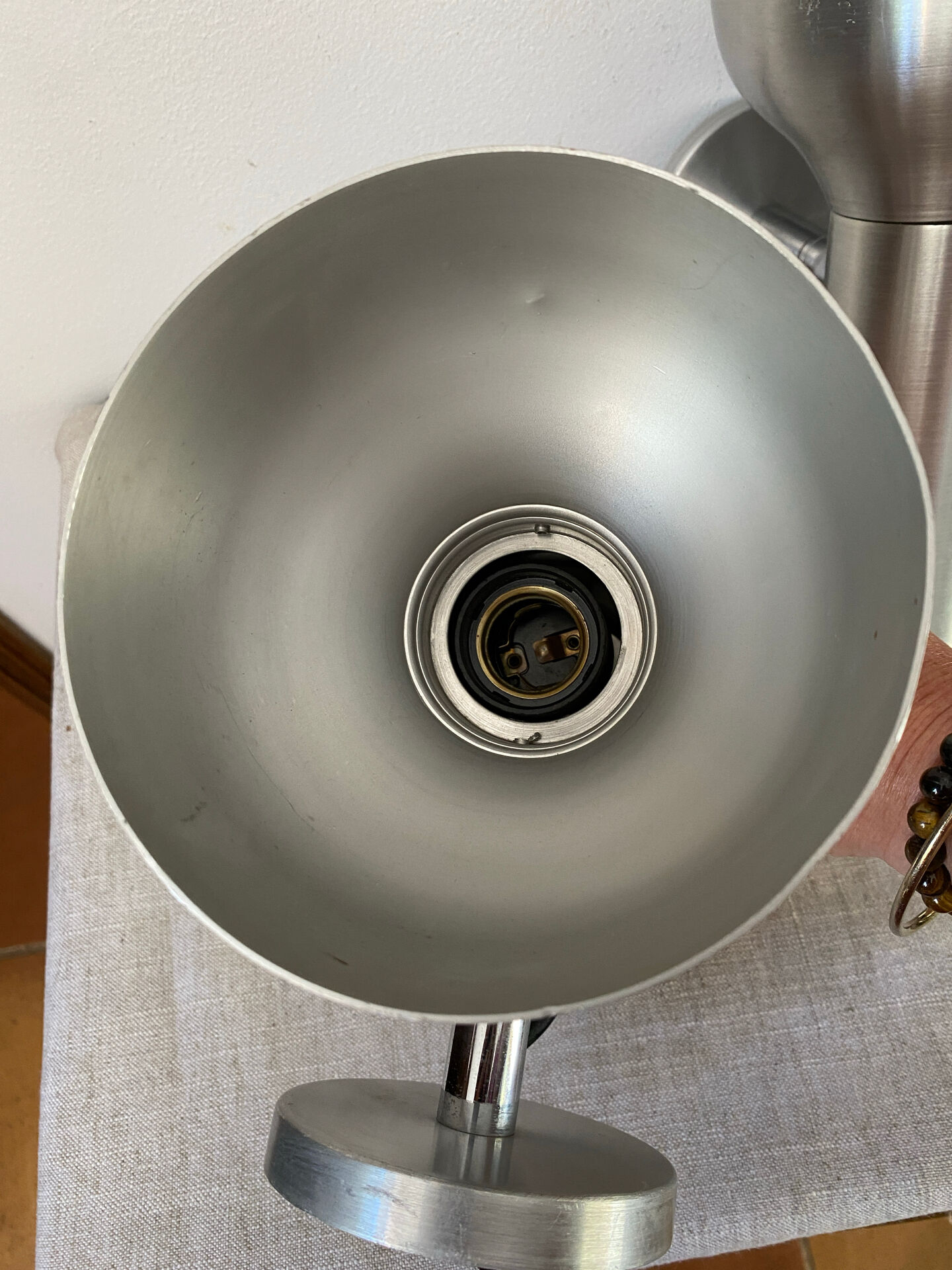 Pair of brushed metal wall sconces