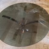 Round coffee table in smoked glass and chrome-plated metal