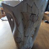 Beige colored vase from the vallauris brand with flower pattern