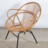 Rattan shell armchair with armrests