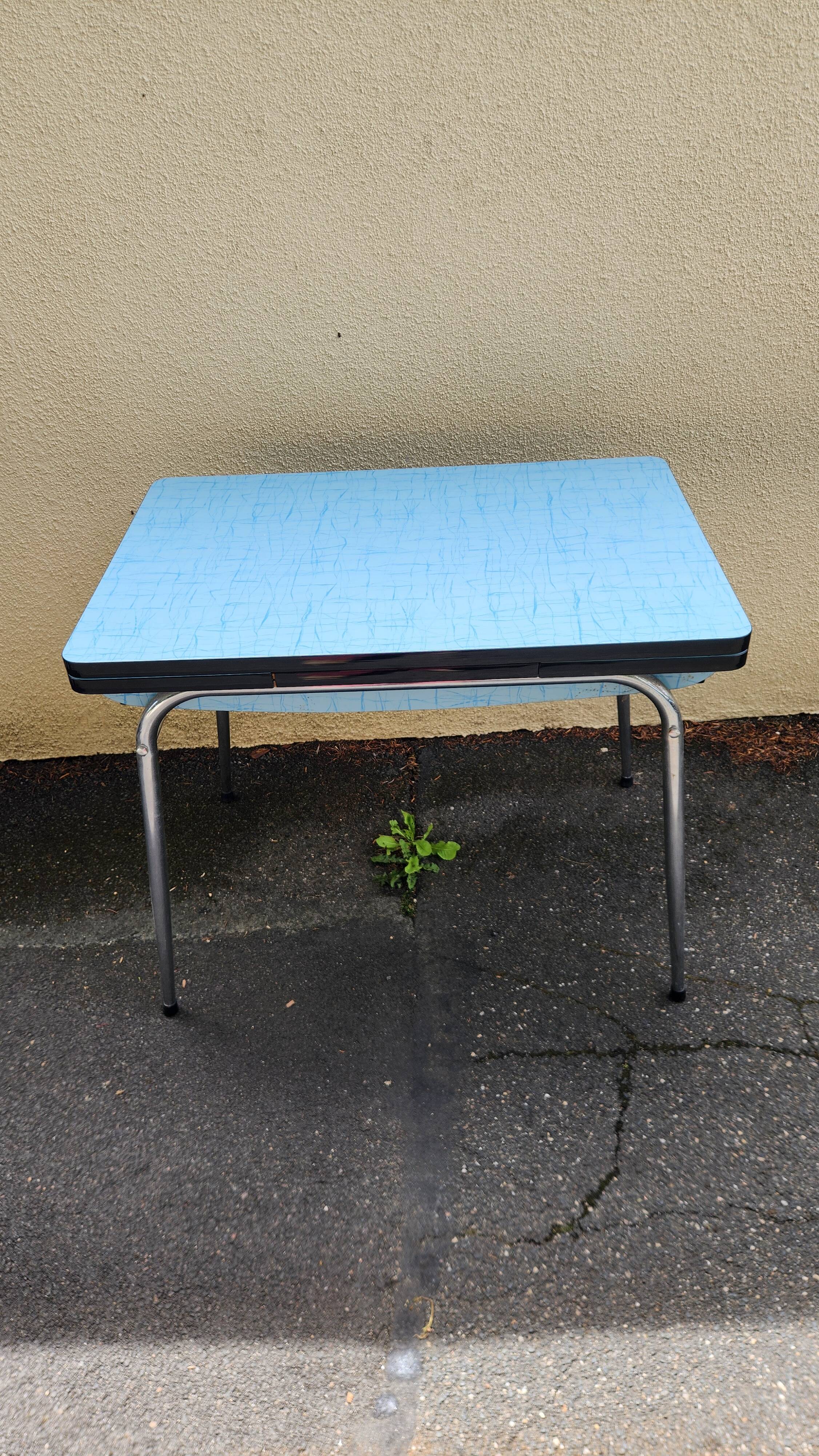 Vintage set from the 60s/70s: table, chairs, and marbled Formica stools.