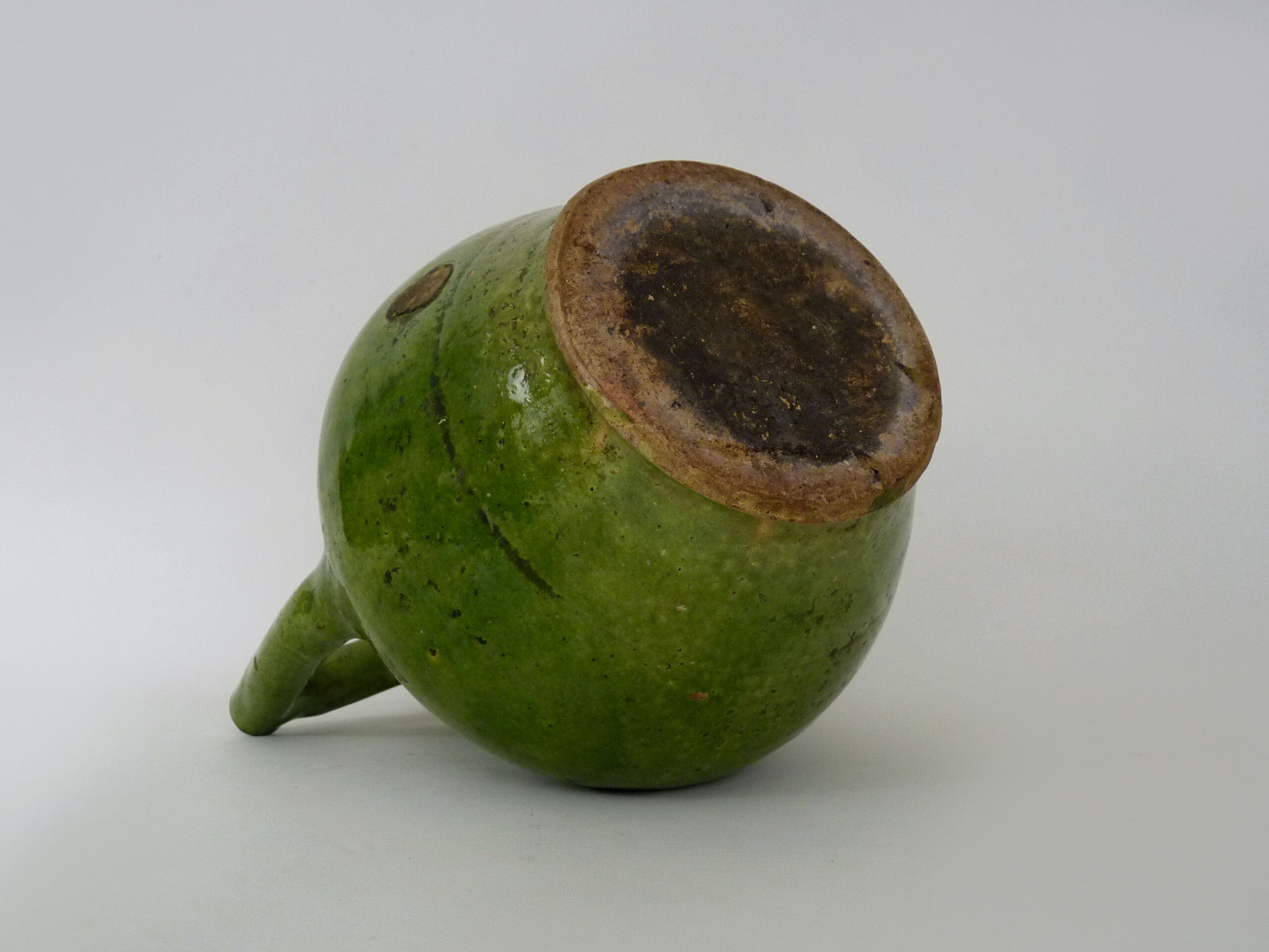 Pitcher pottery in green glazed terracotta, south west of France. XIXth