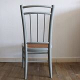 Low chair in wood and canework
