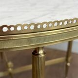 Neoclassical style round coffee table in brass with a white Carrara marble top from Jansen