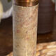 Pair of brass and stone candlesticks
