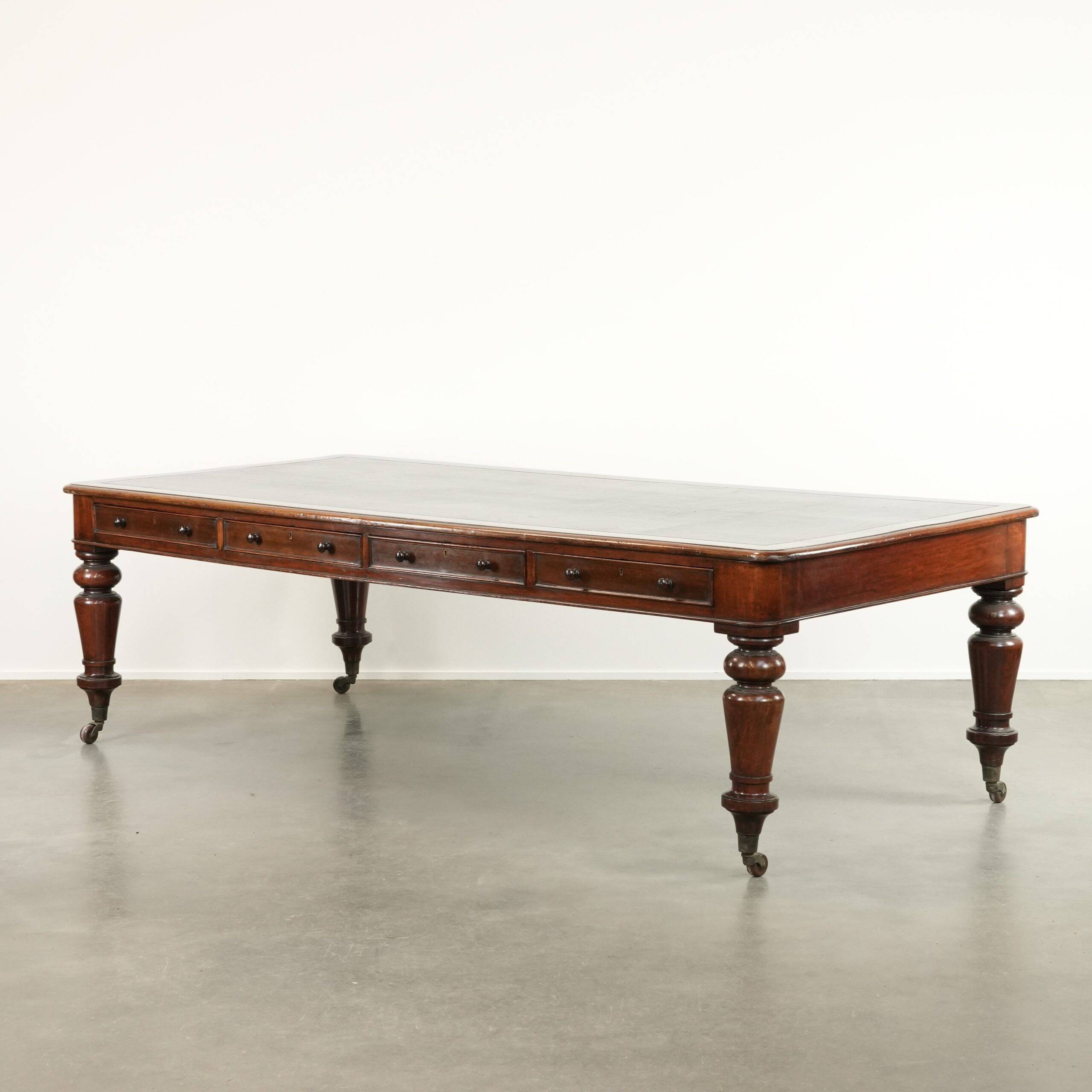 Antique English library table / writing table / desk from the 19th century
