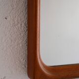Vintage half-bust mirror with wooden frame