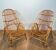 Pair of designer armchairs in rattan