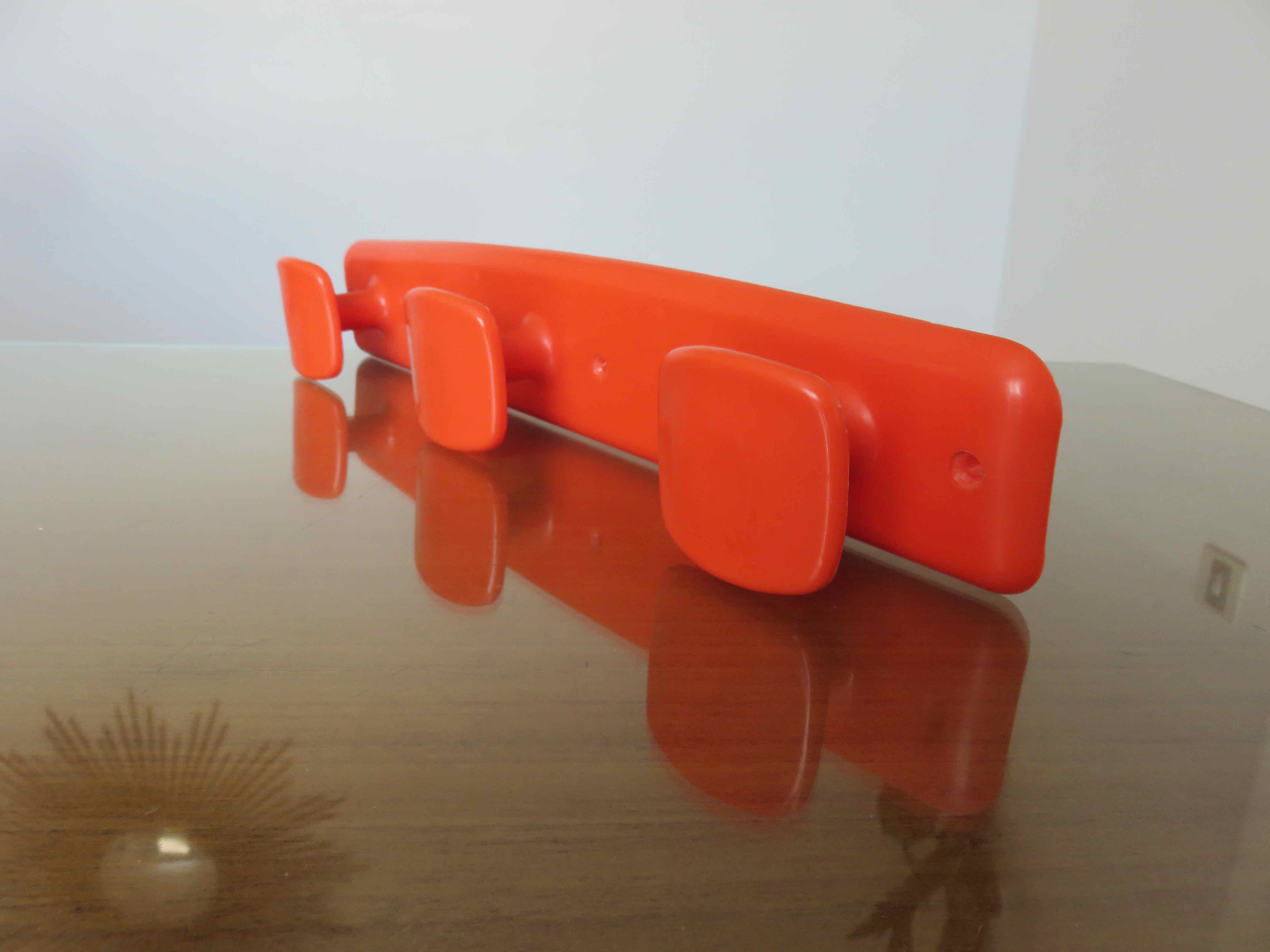 Orange plastic wall coat rack "syla" france 1970