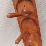 Beautiful Danish wine rack/holder for 3 bottles of wine on the wall. 1980s