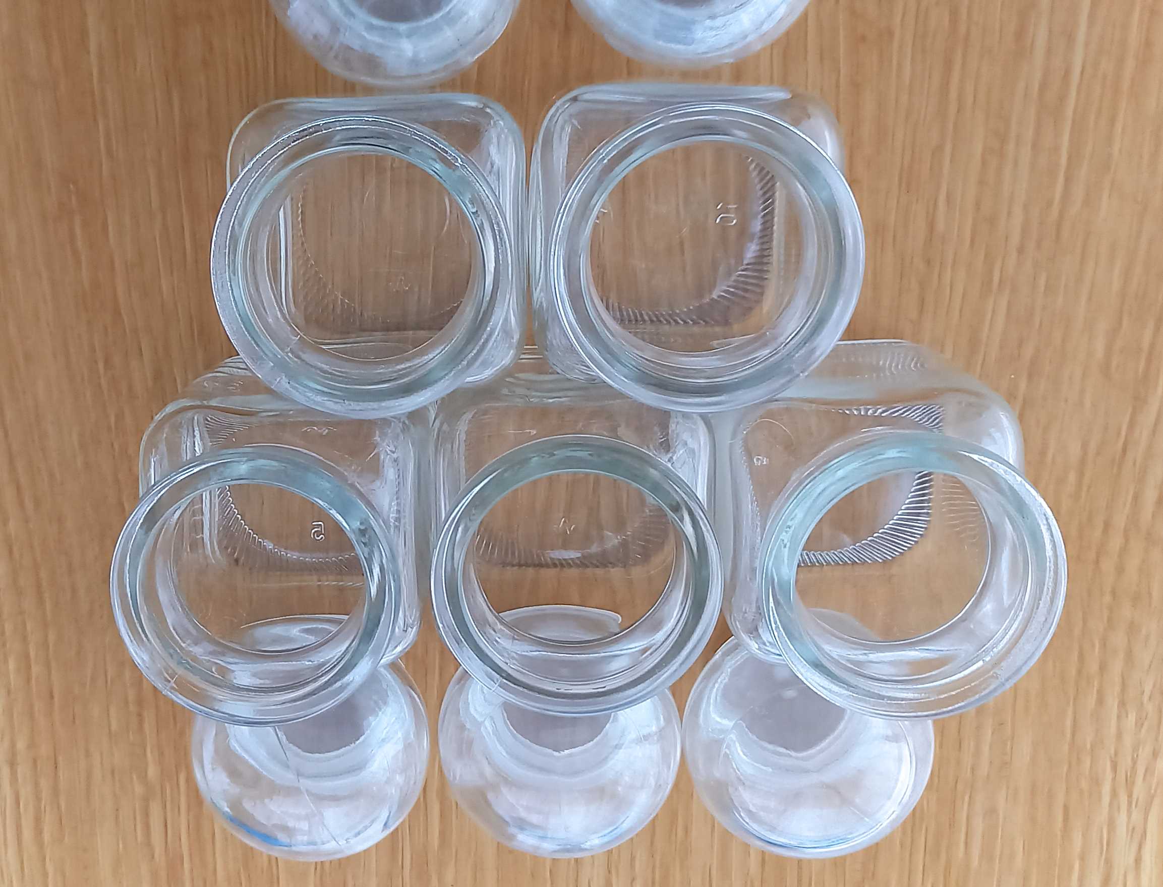 Lot de cinq pots d'apothicaire en verre transparent